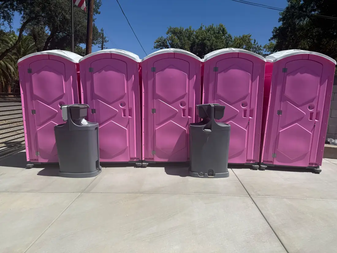 Portable toilets with hand wash stations