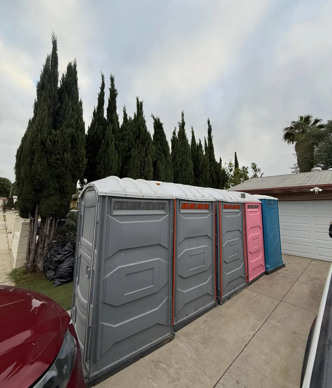 row of porta potties along driveway